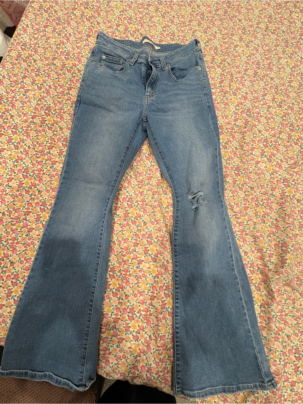 Levi's Light Blue Flare Jeans with Knee Distress